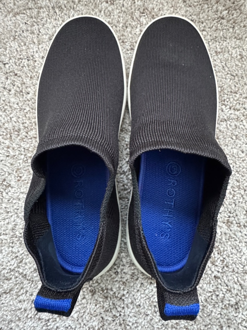 Rothy's Women’s Black Slip-On Knit Sneakers with Blue Insole